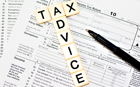 Tax Advice in tiles over tax document